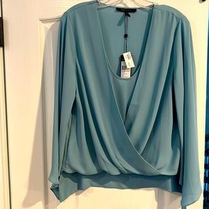 BCBG blouse. Bluish green color. 100% polyester. Size medium